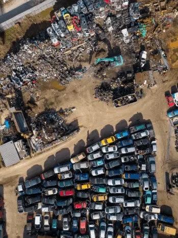 Sustainable scrap car recycling process at an Ontario salvage yard.